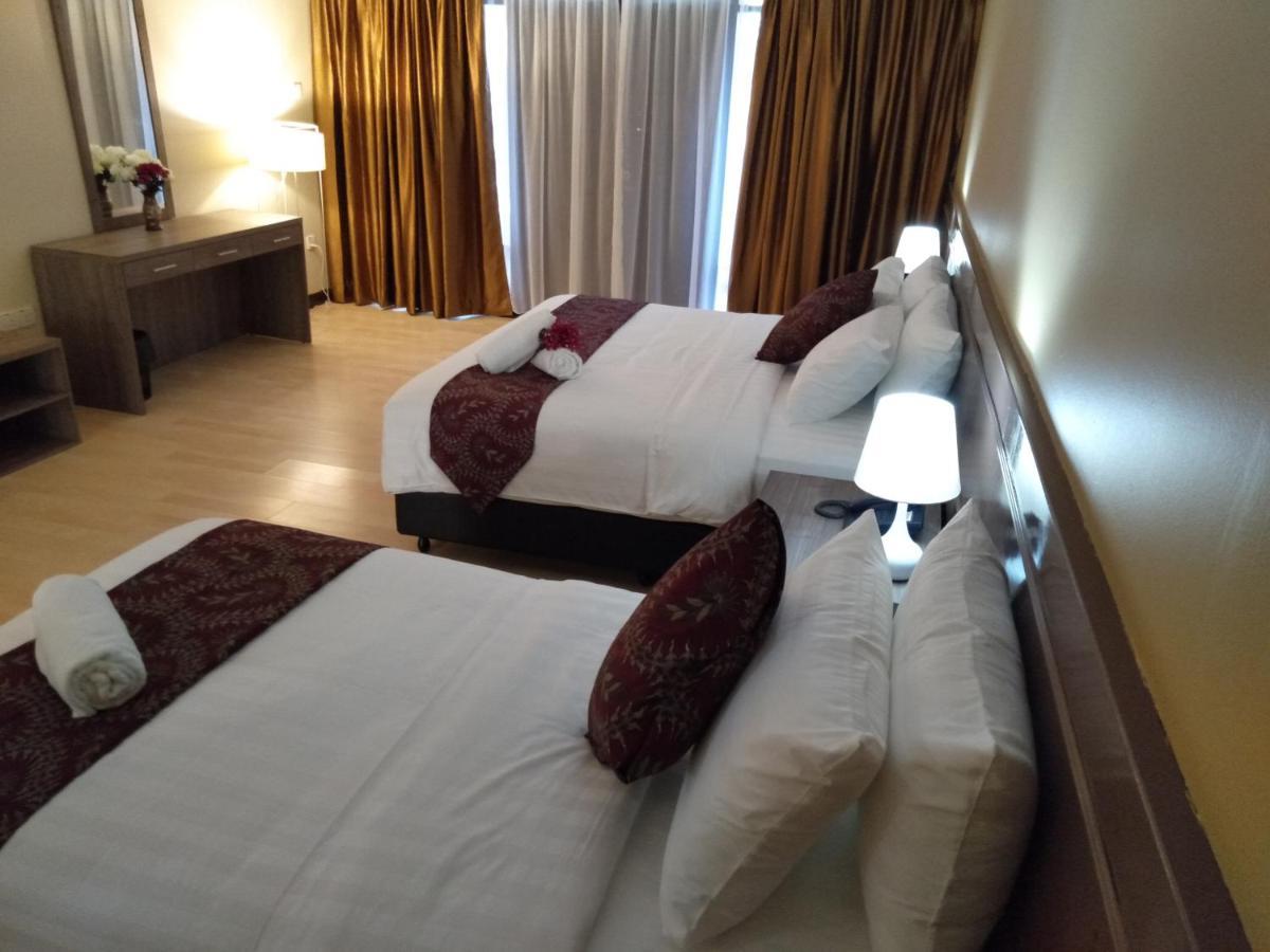 Hotel Temu Primula à Kampong Seberang Timor Extérieur photo