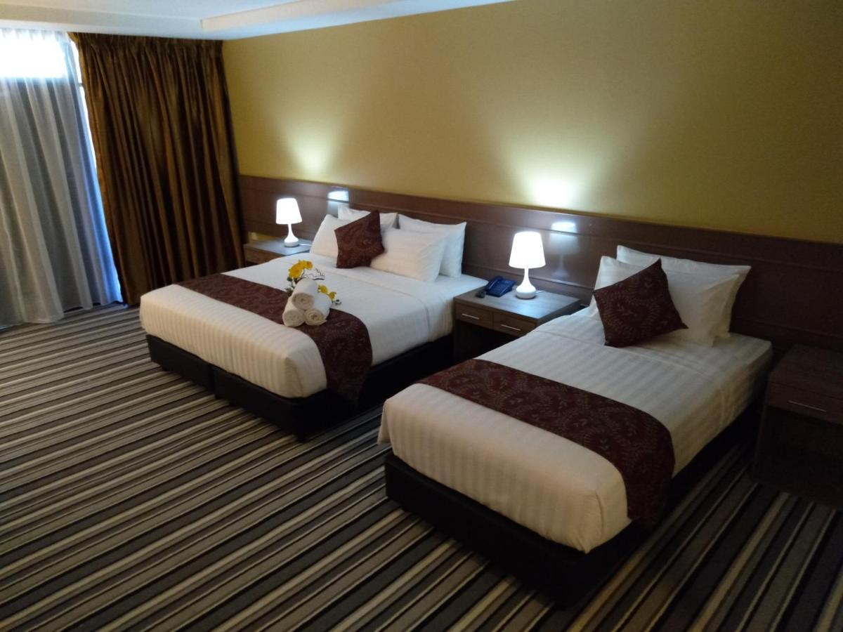Hotel Temu Primula à Kampong Seberang Timor Extérieur photo