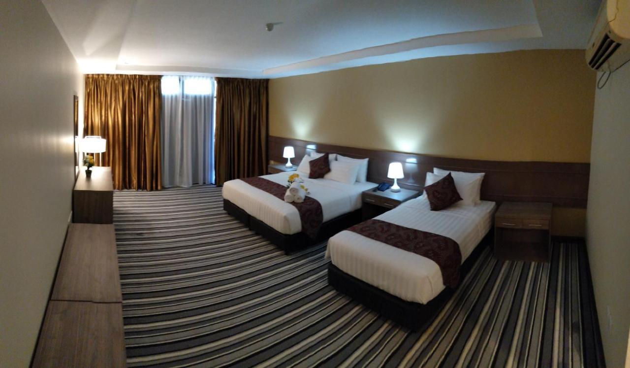 Hotel Temu Primula à Kampong Seberang Timor Extérieur photo