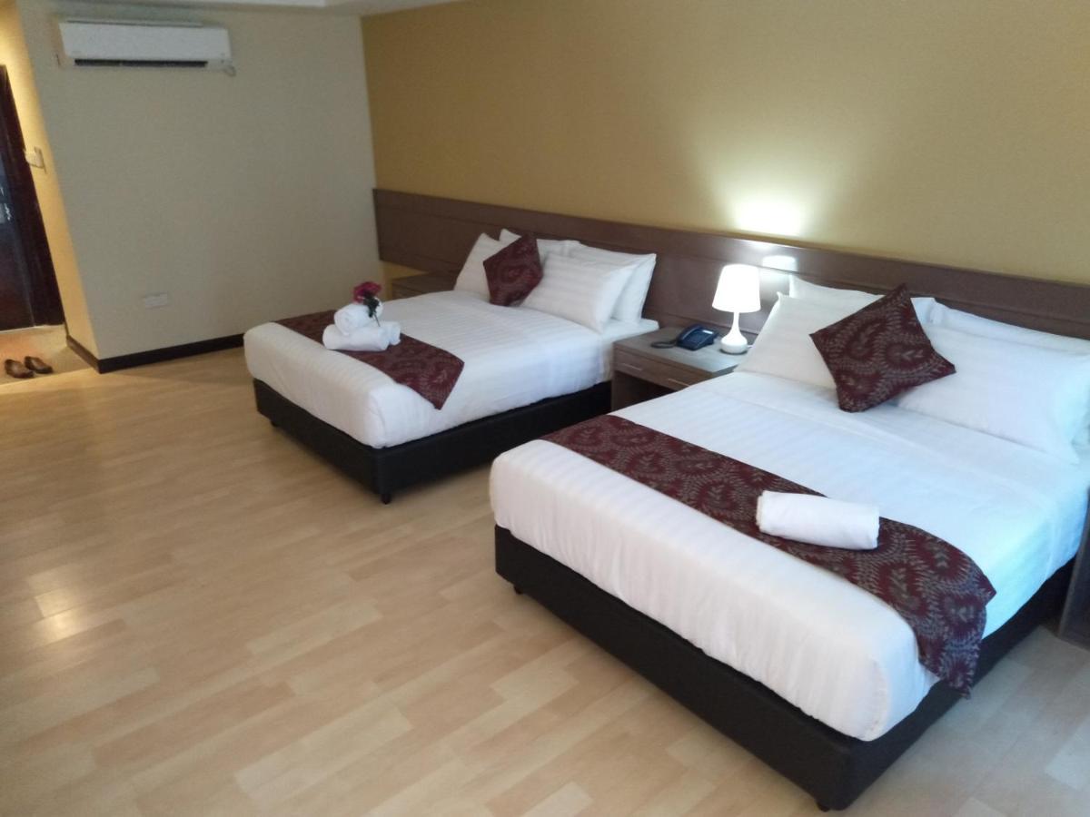 Hotel Temu Primula à Kampong Seberang Timor Extérieur photo