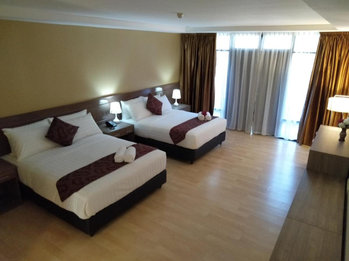 Hotel Temu Primula à Kampong Seberang Timor Extérieur photo