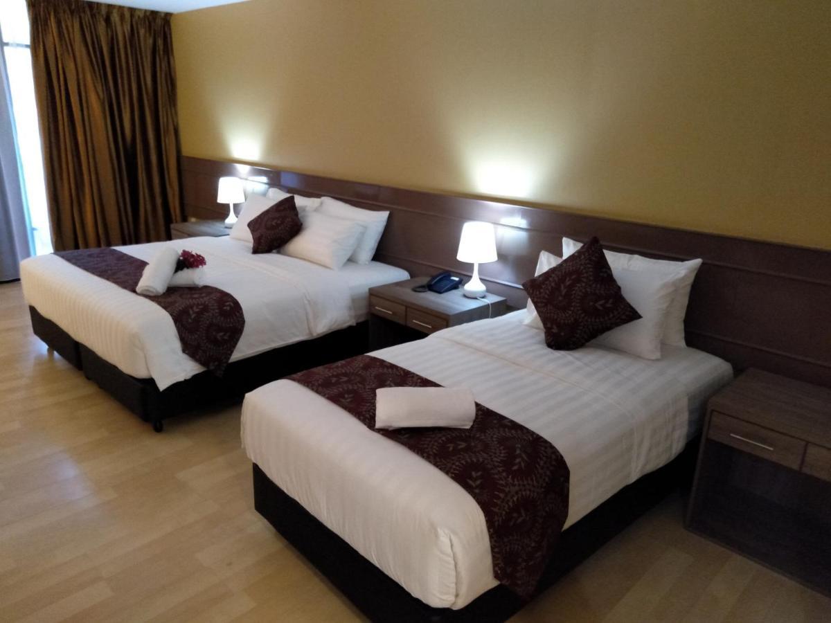 Hotel Temu Primula à Kampong Seberang Timor Extérieur photo