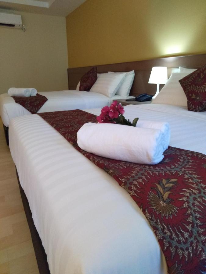 Hotel Temu Primula à Kampong Seberang Timor Extérieur photo